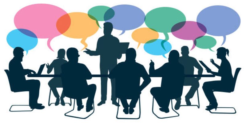 Concept of teamwork with senior executives who discuss to define the company's strategy during a brainstorming.